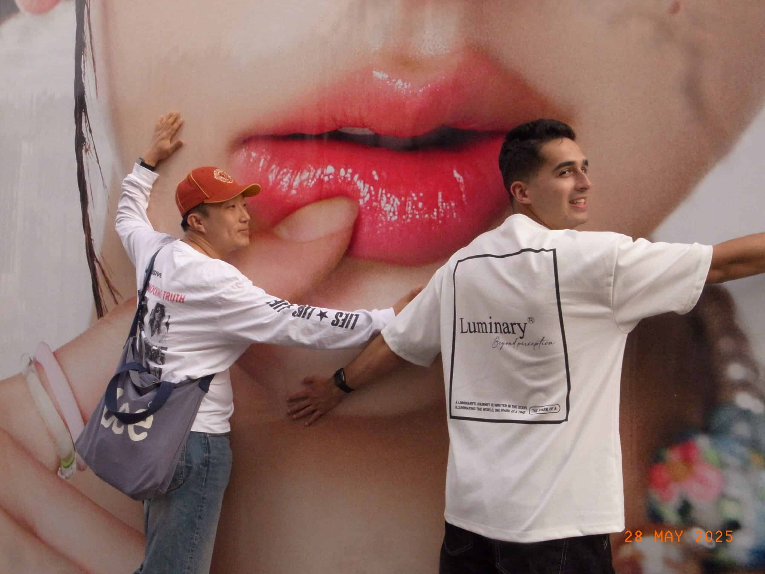 Two mean with big lips behind