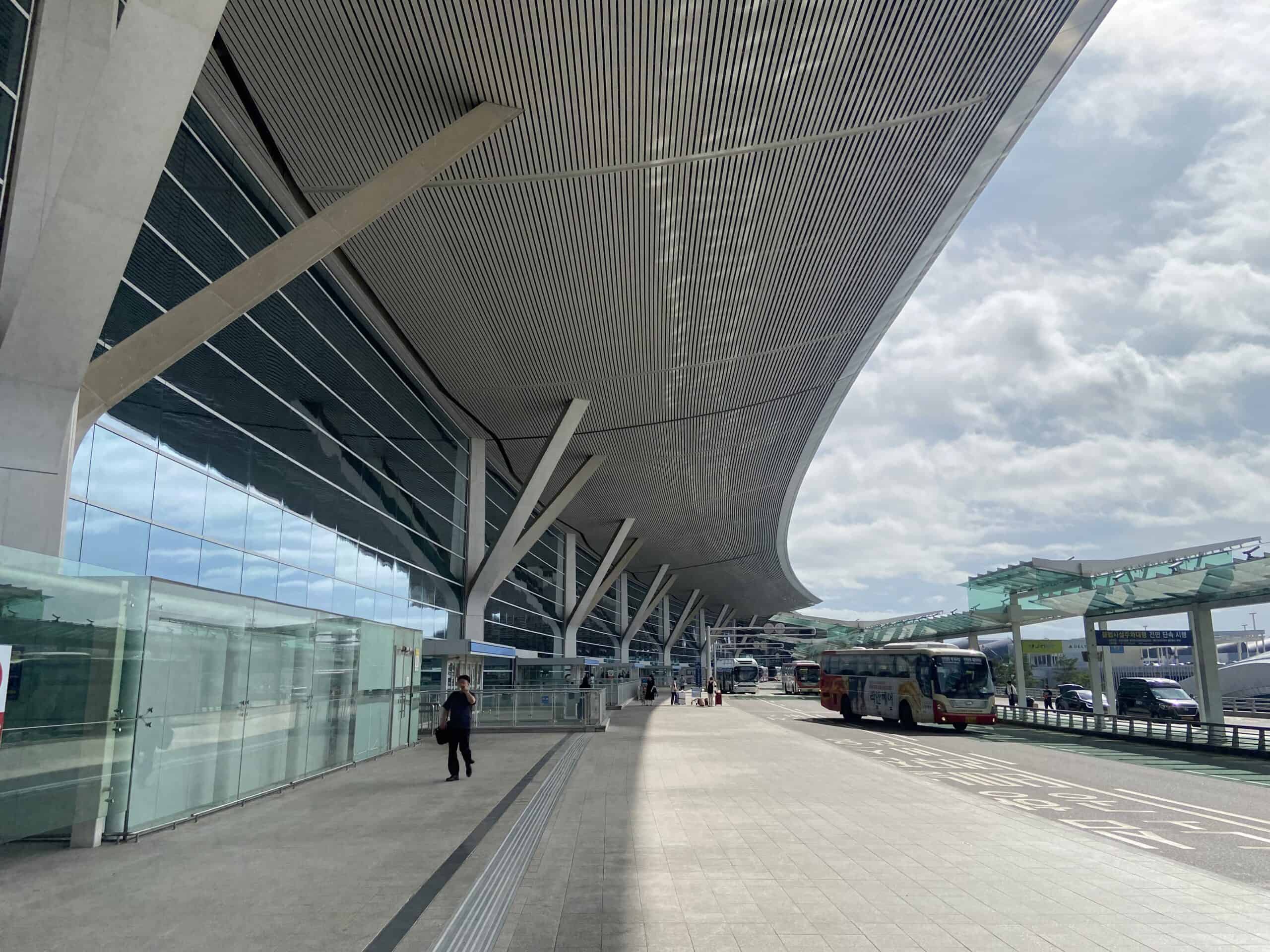 Incheon Airport terminal exterior bus stop arrival Seoul transport