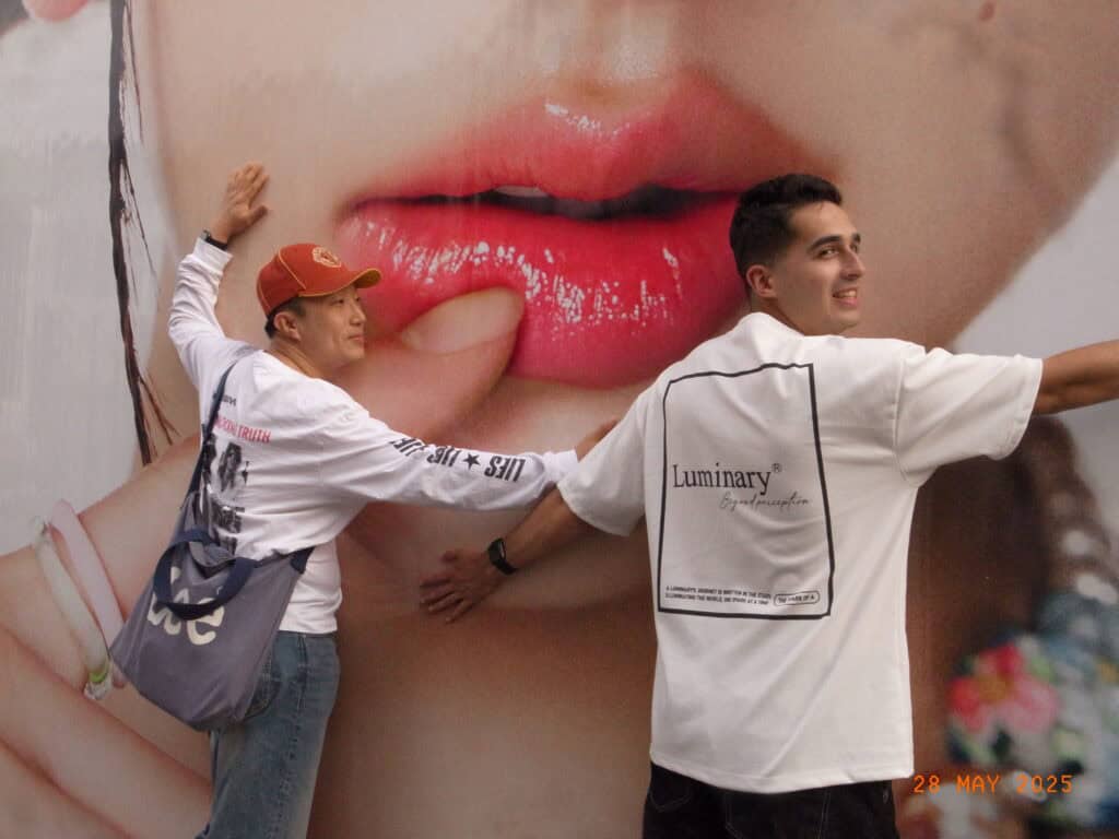 Two mean with big lips behind