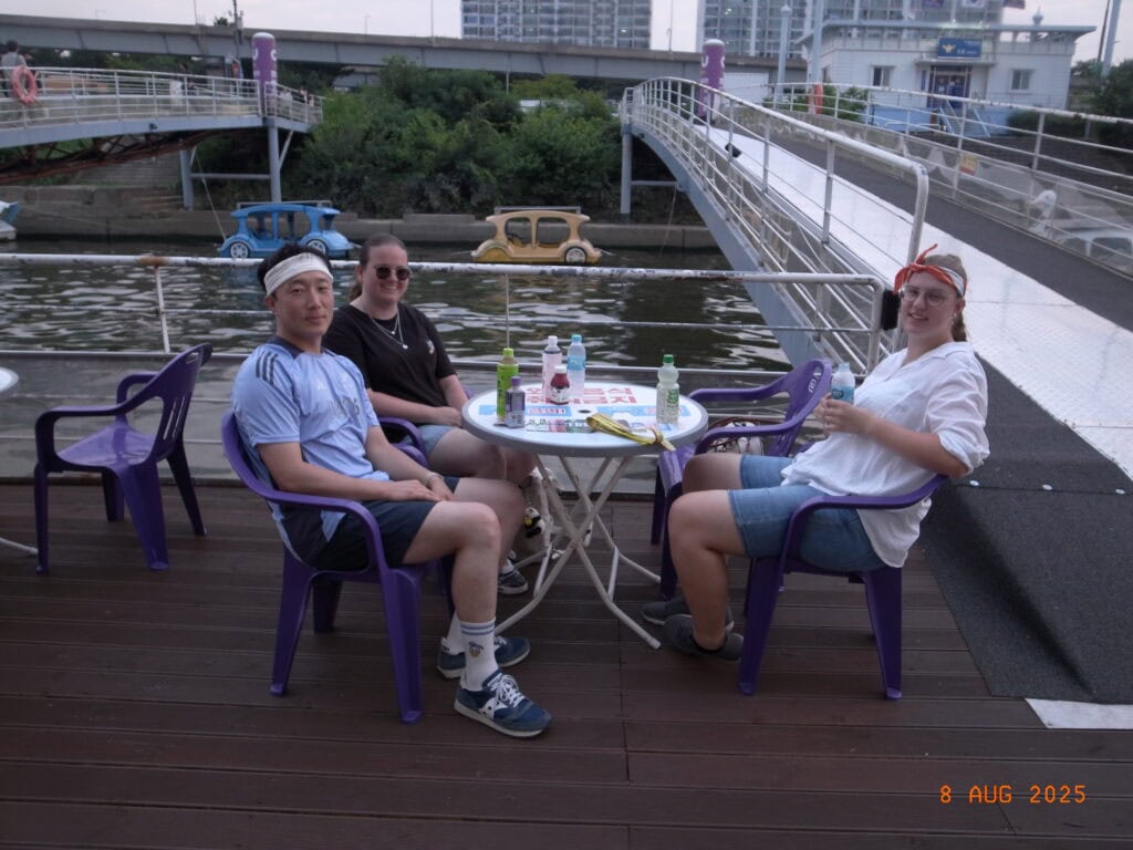 two dutch girls and one Korean man